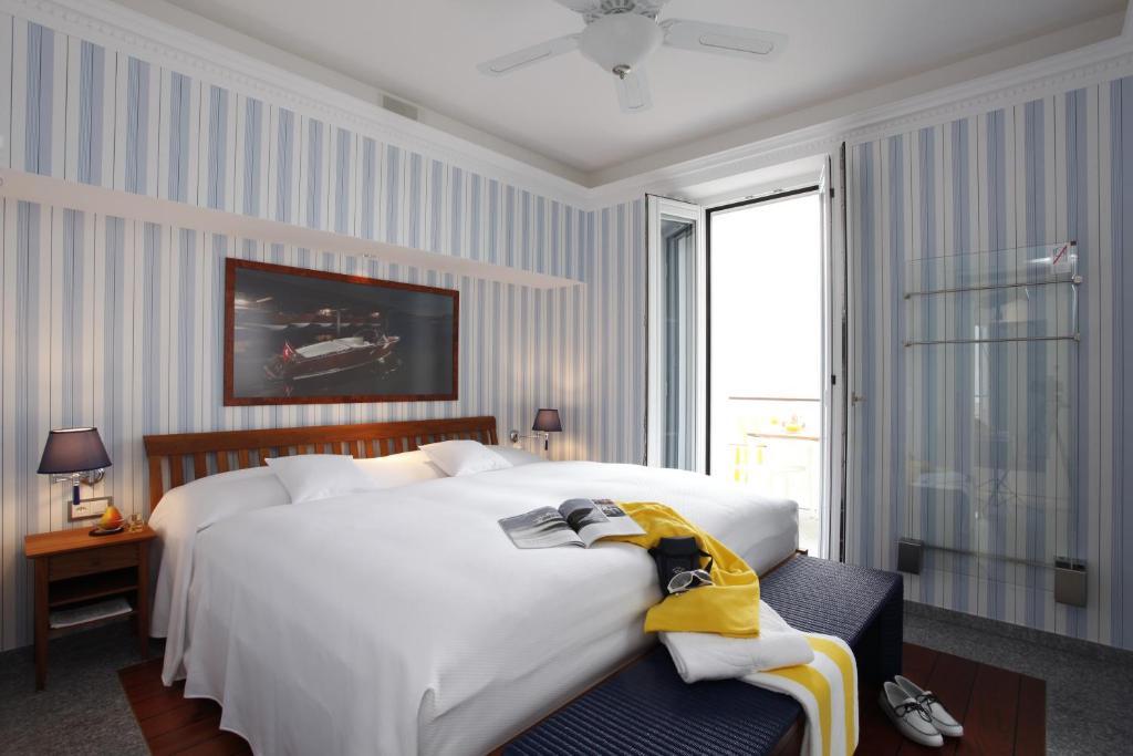 Holiday Hotel Yachtsport Resort Lago Maggiore Брисаго Стая снимка